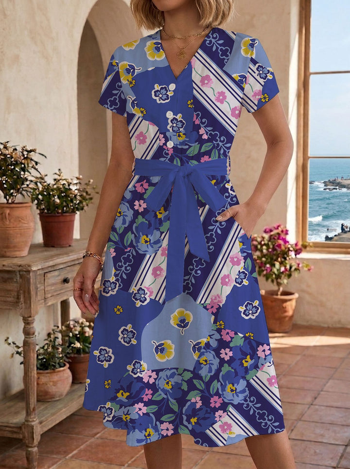 Damen Sommerliches Kleid mit taillierbarem Bindegürtel und floralem Muster Drune