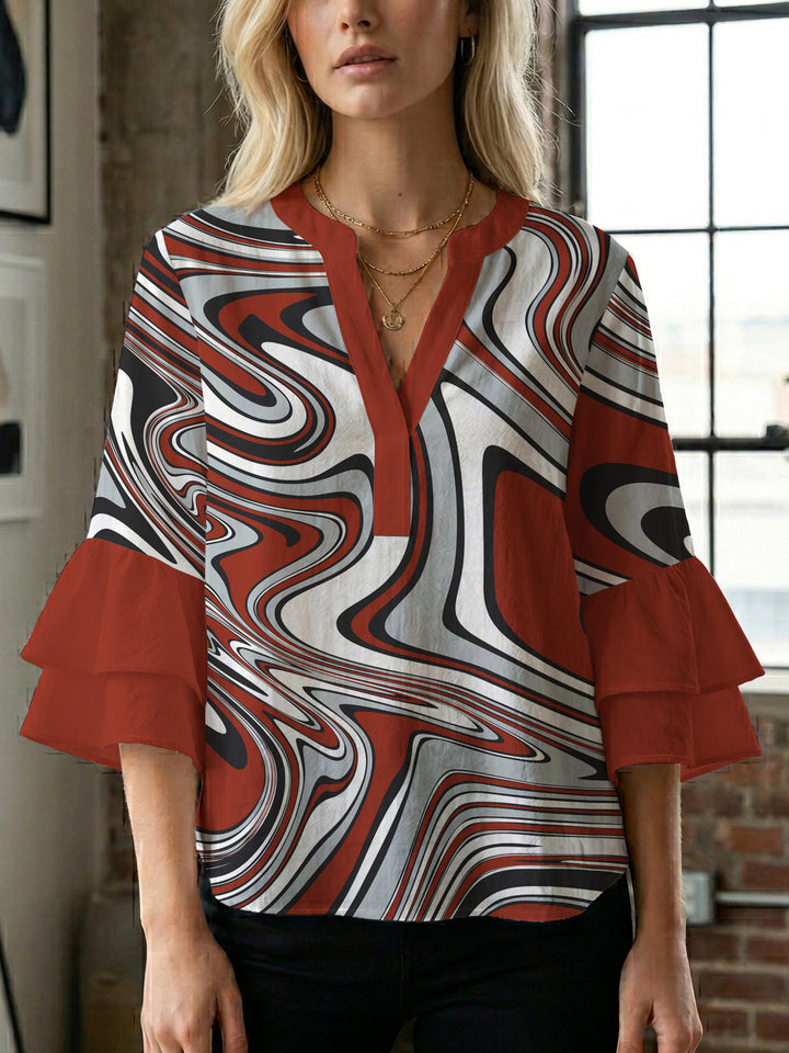 Damen Bluse mit voluminösen Flügelärmel und intensivem Blattmuster Drune