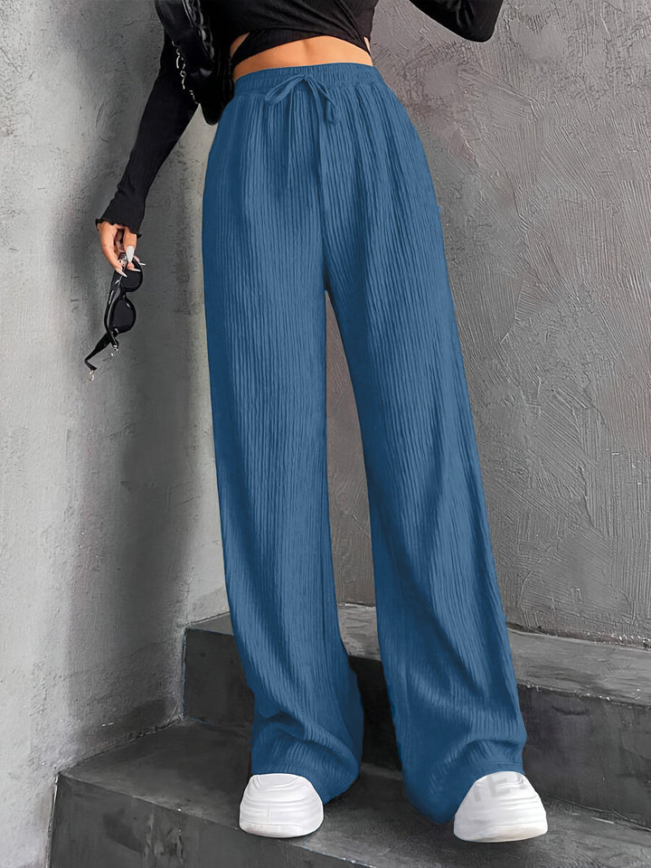Damen Weit geschnittene Plissee-Hose mit elastischem Bund und praktischen Eingrifftaschen Drune