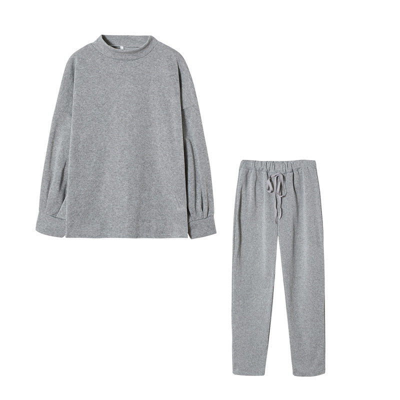 Damen Sportanzug im modernen Schnitt mit hochgeschlossenem Oberteil und elastischen Hosen Drune