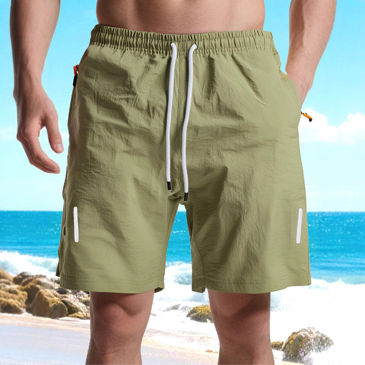Herren nan ultraleichte schnelltrocknende Sport- und Badeshorts mit Elastikbund Kordelzug Reißverschlusstasche und reflektierendem Detail Drune