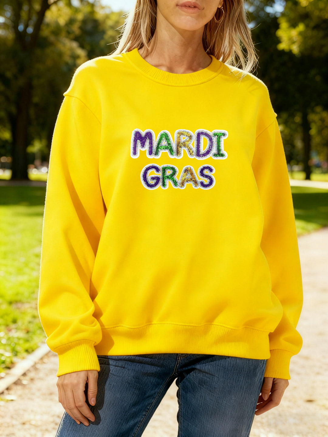 Damen Sweatshirt mit lebhaftem Mardi Gras Schriftzug Drune