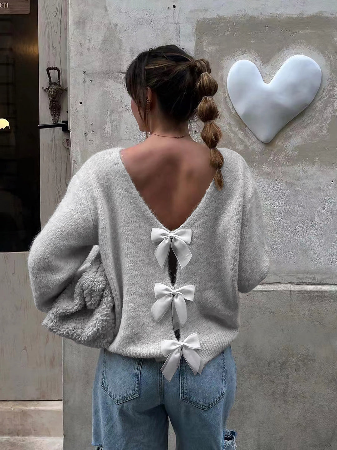 Damen modischer Strickpullover mit V-Ausschnitt und Schleifendetails Drune