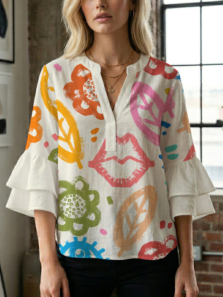 Damen Bluse mit voluminösen Rüschenärmeln und floralem Muster Drune