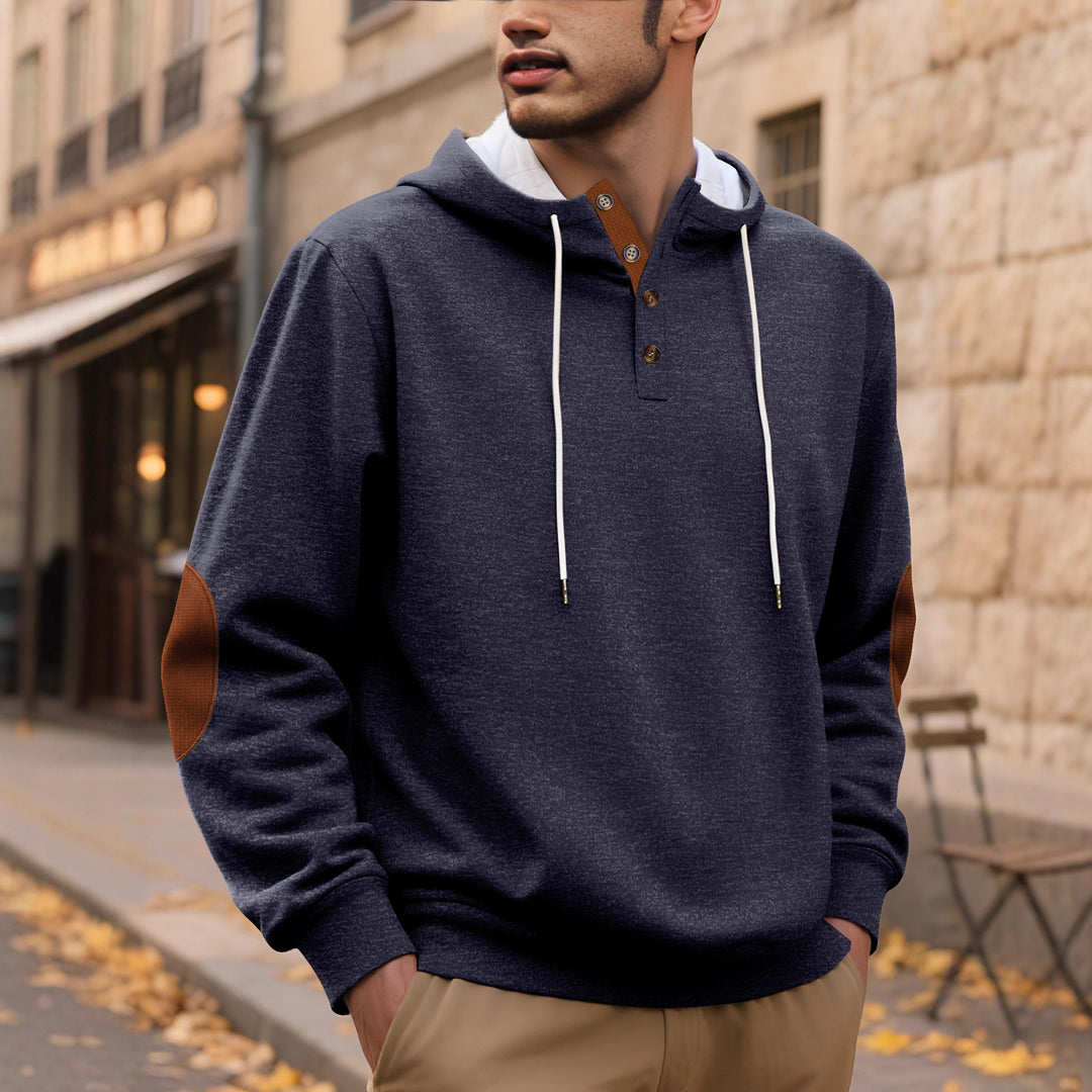 Herren nan Kapuzenpullover im puristischen Freizeitstil mit Henley-Knopfleiste, kontrastierter Kapuzeninnenseite und Ellenbogenaufnähern Drune