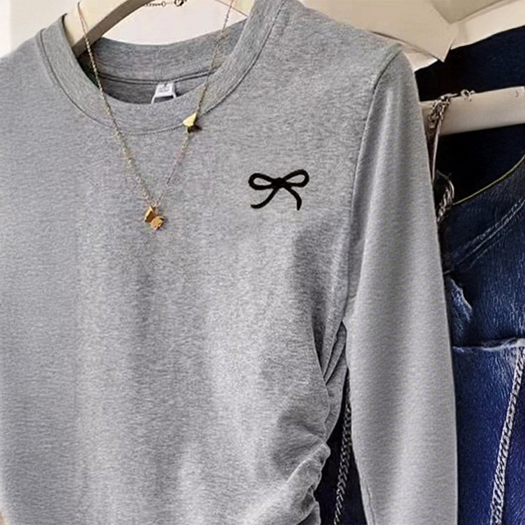 Damen nan gerüschtes Langarmshirt mit dezenter Schleifen-Stickerei und taillierter Drapierung Drune