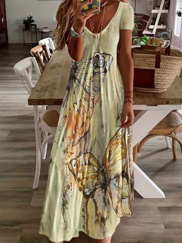 Damen Maxikleid mit floralen Schmetterlingsmotiven und weich fließendem Stoff Drune