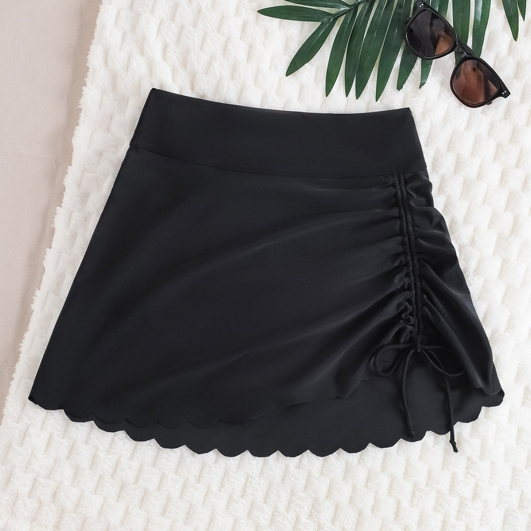 Damen Baderock mit asymmetrischer Raffung und elegantem Wellenabschluss Drune