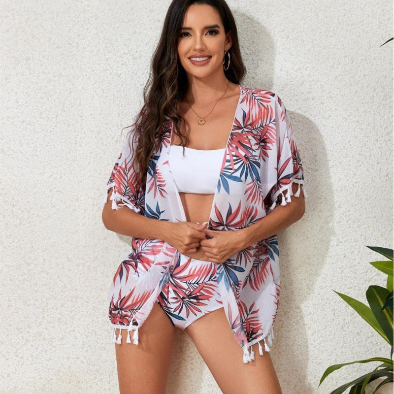 Damen Strandkleid mit floralem Design und fransenverziertem Überwurf Drune