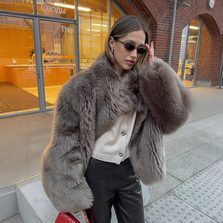 Damen luxuriöse Kunstfelljacke mit voluminösen Ärmeln Drune