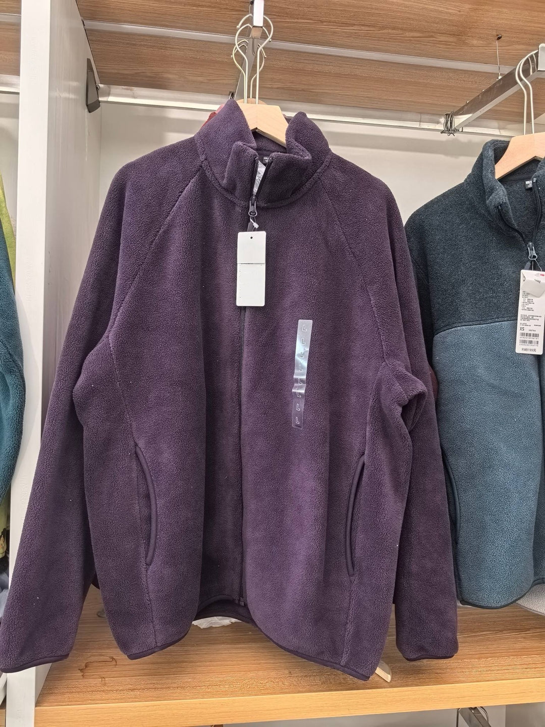 Damen Fleecejacke mit hohem Kragen und seitlichen Taschen Drune