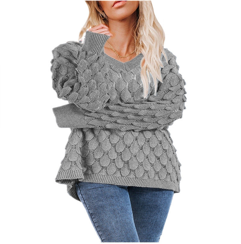 Damen Grobstrickpullover mit skulpturalem Wellenmuster und V-Ausschnitt Drune