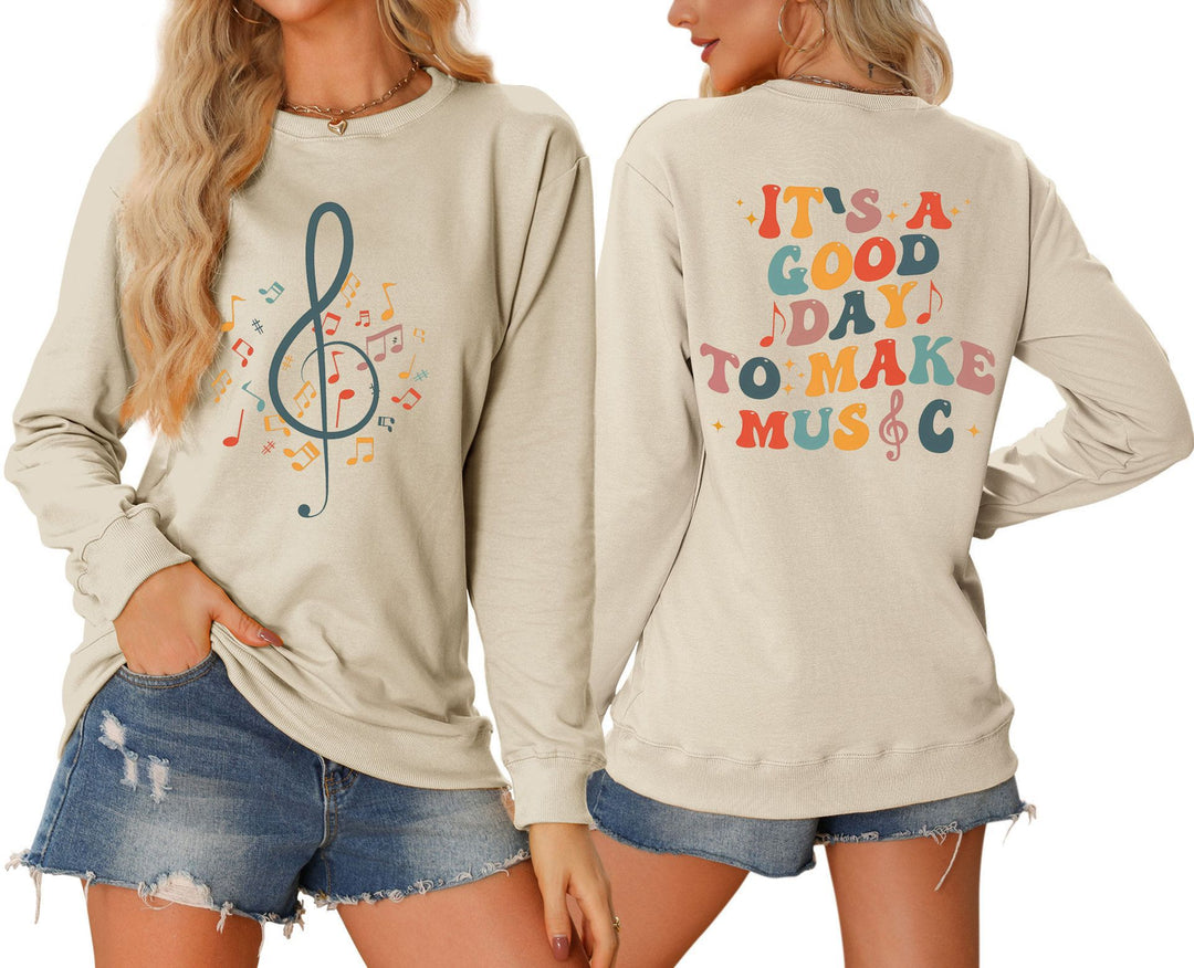 Damen Sweatshirt mit musikalischem Motiv und kreativem Schriftzug Drune
