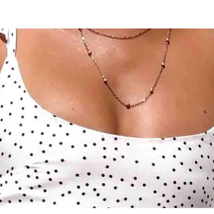 Damen Kleid mit modernen Rüschendetails und verspieltem Punktemuster Drune