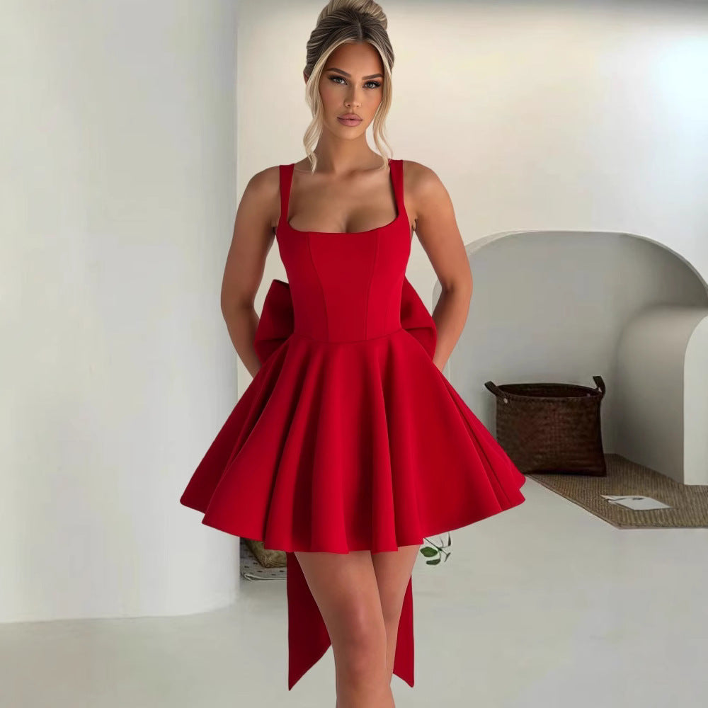 Damen Cocktailkleid mit oversized Schleifen-Design und fließendem Rock Drune