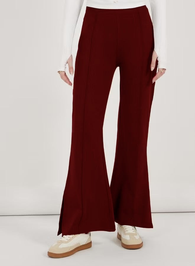 Damen weite Flared-Hose aus strukturiertem Material mit seitlichen Schlitzen Drune