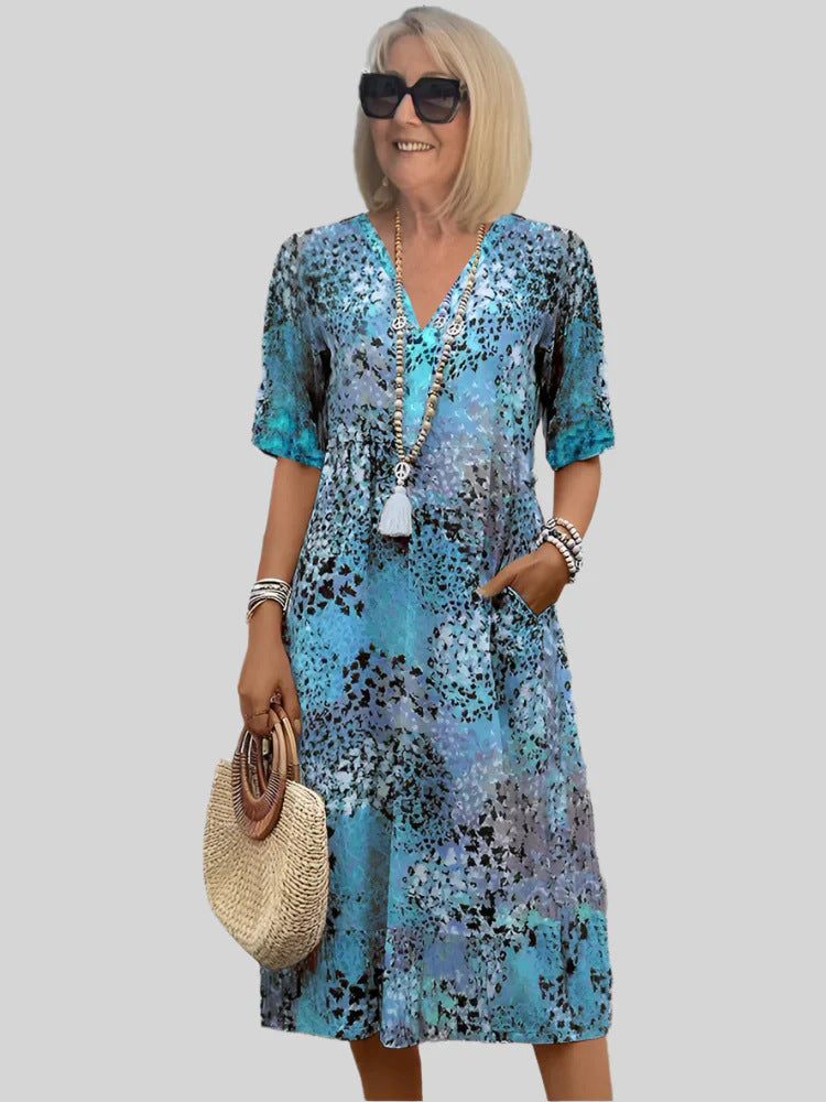 Damen Blumenmuster Midi Kleid mit Taschen Drune