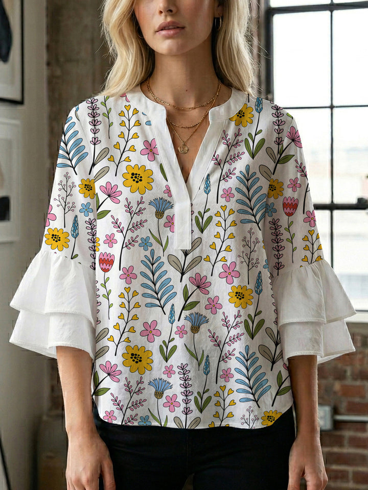 Damen Bluse mit voluminösen Rüschenärmeln und floralem Muster Drune