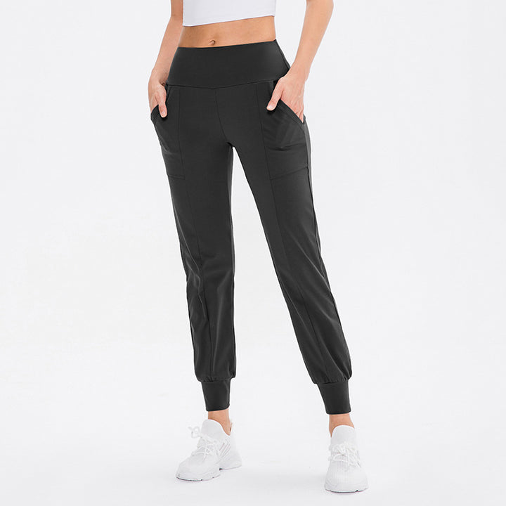 Damen elastische Sporthose mit praktischen Seitentaschen und temperaturregulierendem Material Drune