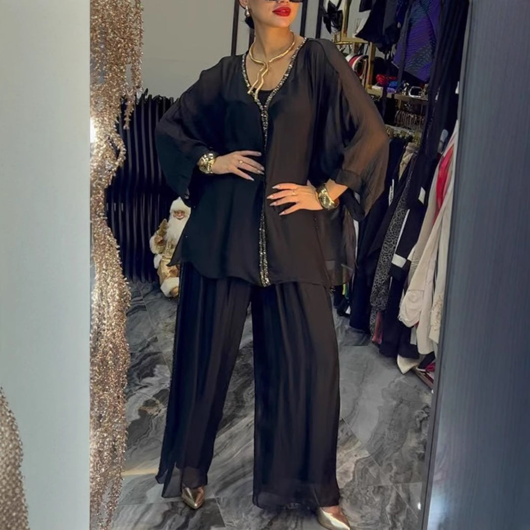 Damen luftiges Jumpsuit mit elegantem Overlay und glitzernden Details Drune