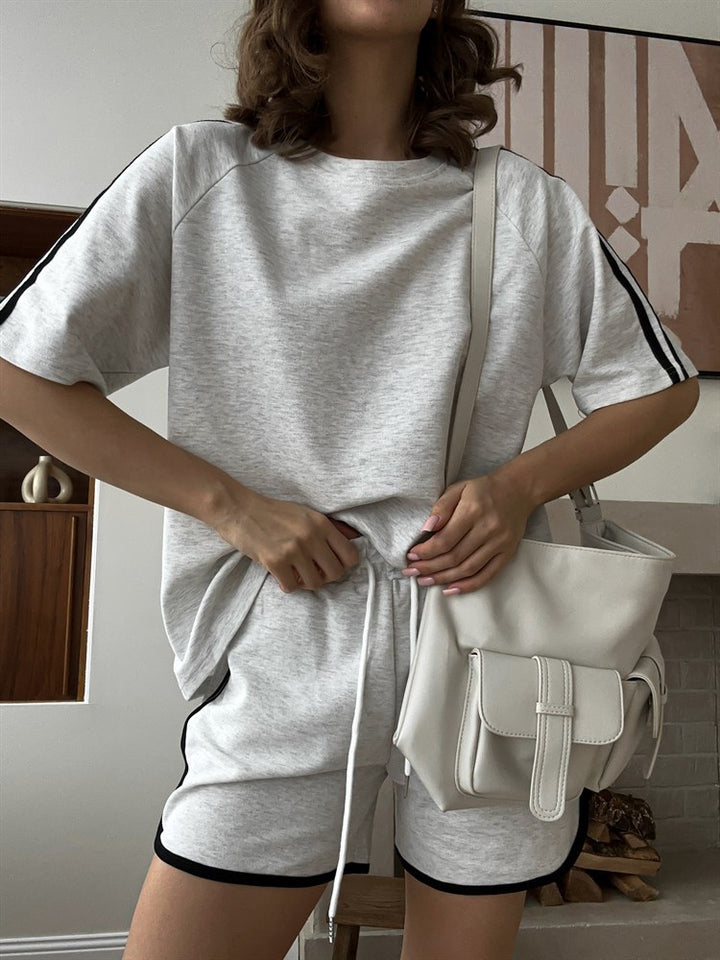 Damen sportliches Kurzarm-Set mit seitlichen Kontraststreifen und elastischer Taille Drune