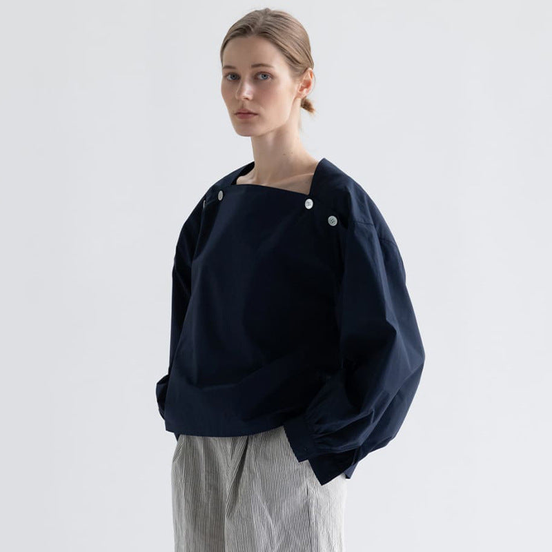 Damen modische Bluse mit innovativen Knopfdetails Drune
