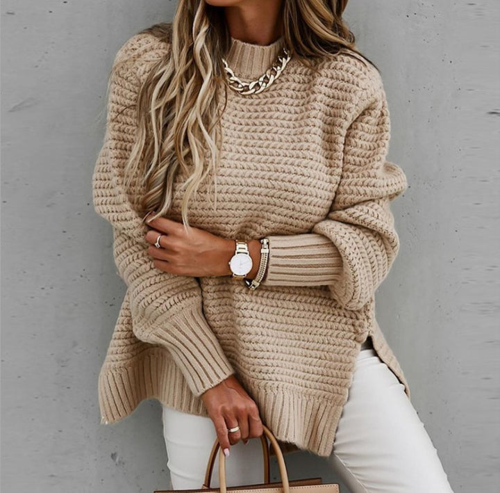 Damen Grobstrickpullover mit hochgeschlossenem Kragen und seitlichen Schlitzen Drune