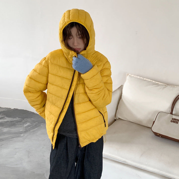 Damen ultraleichte Pufferjacke mit abnehmbarer Kapuze und elastischem Saum Drune