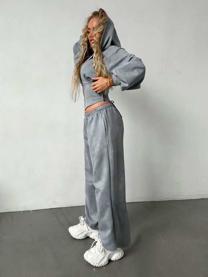 Damen sportliches Set aus cropped Kapuzenjacke und weiten Jogginghosen mit elastischem Bund Drune