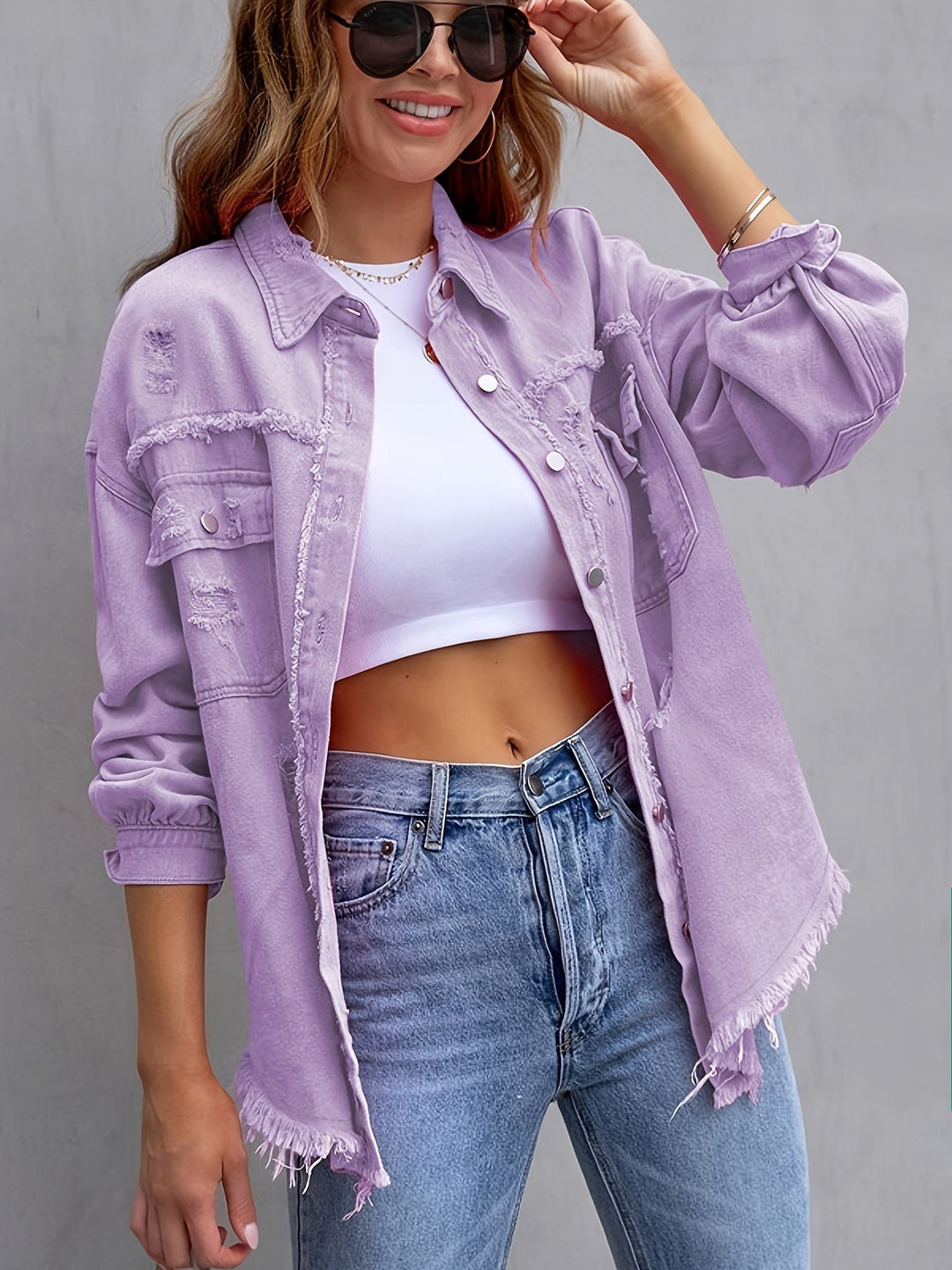 Damen oversized Jeansjacke mit fransigen Säumen und aufgesetzten Taschen Drune