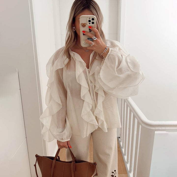 Damen Bluse mit voluminösen Rüschendetails und gewelltem Saum Drune