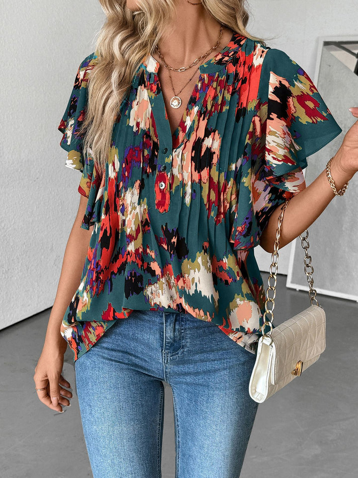 Damen Bluse mit eleganten Rüschendetails und verspieltem Print Drune