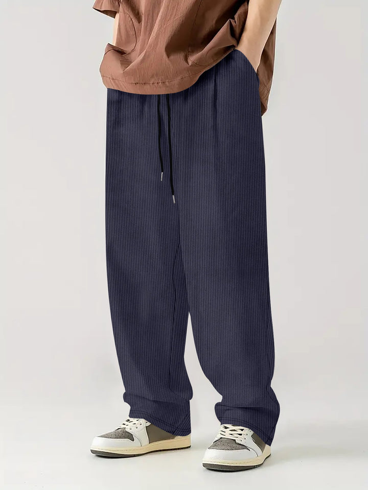 Herren nan weite Relax-Freizeithose aus geripptem Jersey mit Kordelzug, Seitentaschen und weitem Bein Drune