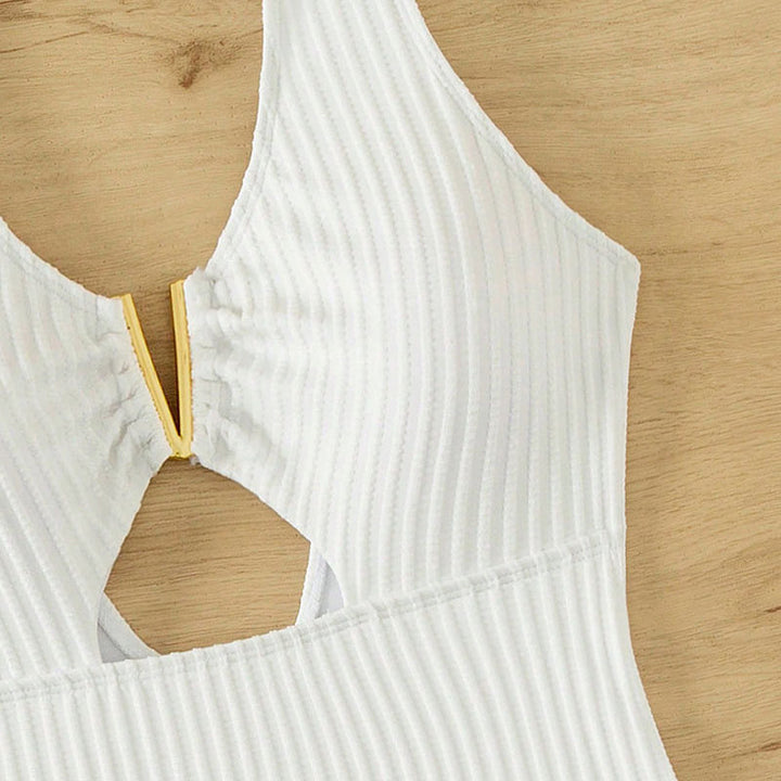 Damen Einteiler Badeanzug mit schickem Cut-Out und dekorativem Gold-Detail Drune