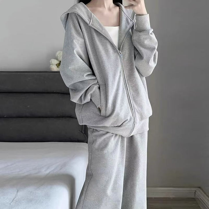 Damen Bequemes Oversized Sportanzug mit Kapuze und seitlichen Taschen Drune