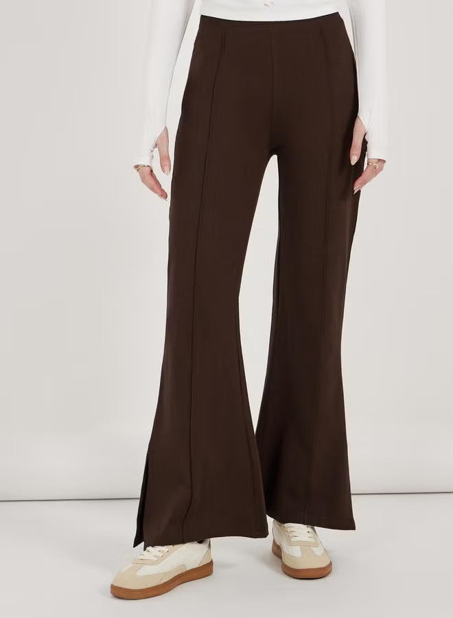Damen weite Flared-Hose aus strukturiertem Material mit seitlichen Schlitzen Drune