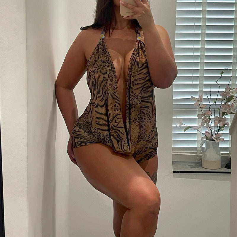 Damen eleganter Einteiler mit tiefem V-Ausschnitt und verspieltem Animal-Print Drune