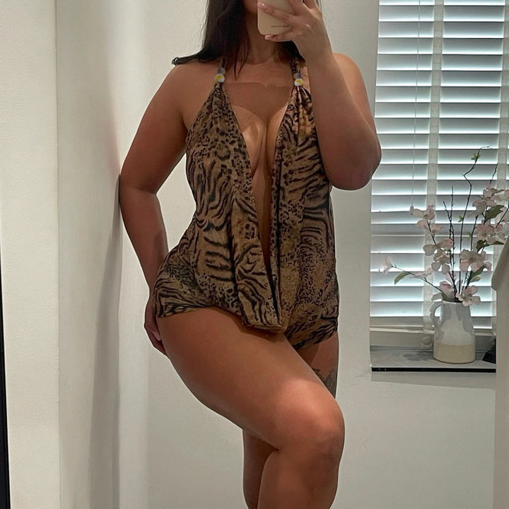 Damen eleganter Einteiler mit tiefem V-Ausschnitt und verspieltem Animal-Print Drune