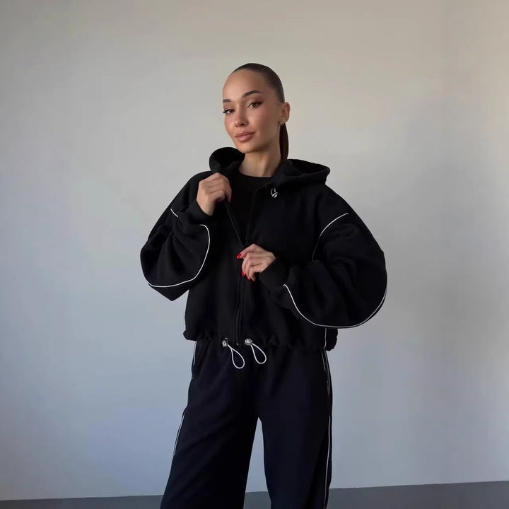Damen lässiger Kapuzen-Sweatanzug mit weiten Hosen und seitlichem Streifen Drune
