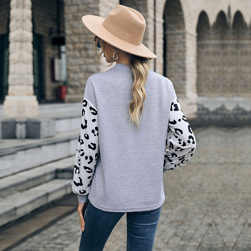 Damen Sweatshirt mit V-Ausschnitt und trendigen Leopardenärmel Drune
