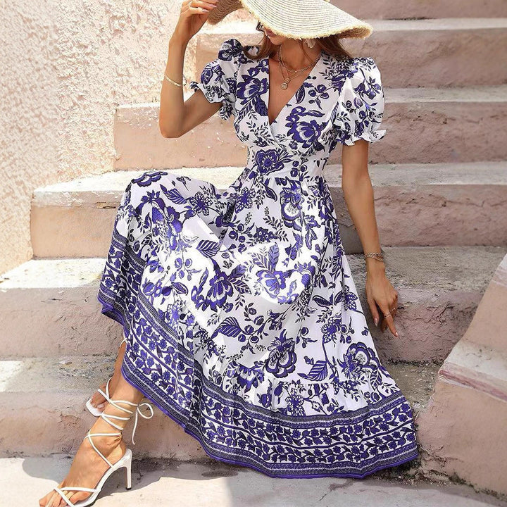 Damen nan boho-inspiriertes Maxikleid mit geraffter Empire-Taille, kurzen Puffärmeln und dekorativem Bordürenprint Drune
