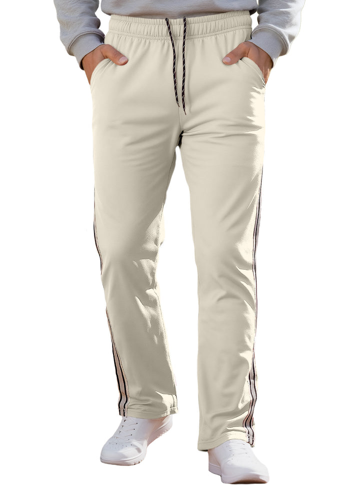 Herren nan Retro-Trackhose mit schmal zulaufendem Bein elastischem Bund Tunnelzug und seitlichen Streifen Drune