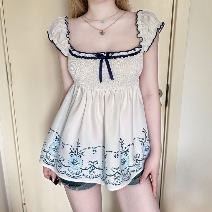 Damen Baumwollbluse mit floralem Stickdesign und schickem Rüschensaum Drune