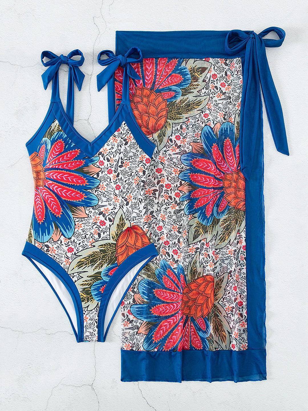 Damen Einteiler Badeanzug mit floralem Muster und seitlichem Wickelrock Drune