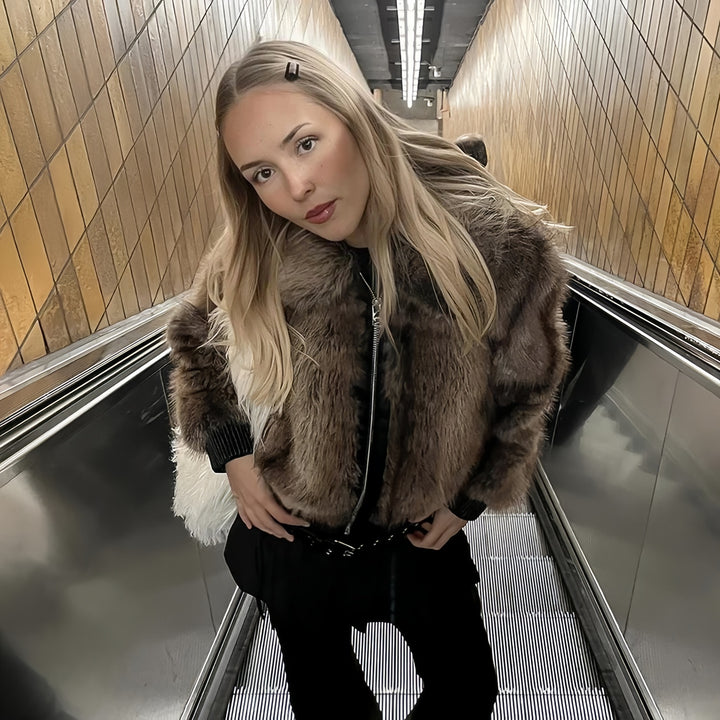 Damen Kunstpelzjacke mit voluminösen Ärmeln Drune