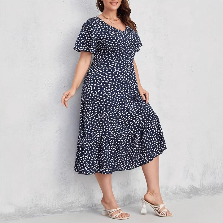 Damen Midi-Kleid mit fließendem Schnitt und verspieltem Muster Drune