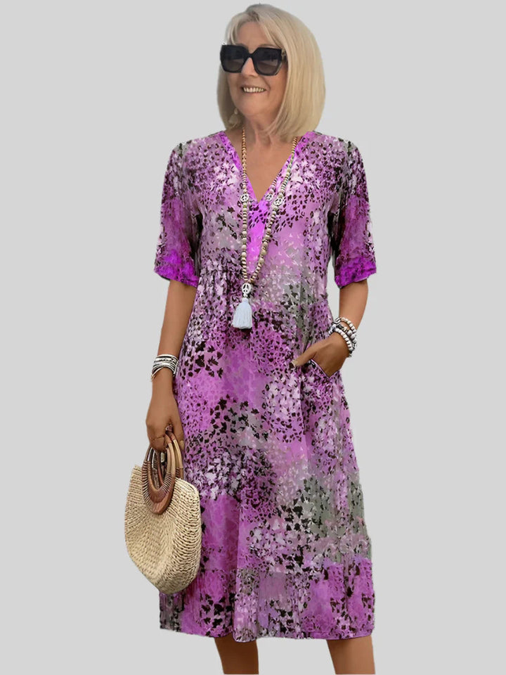 Damen Blumenmuster Midi Kleid mit Taschen Drune