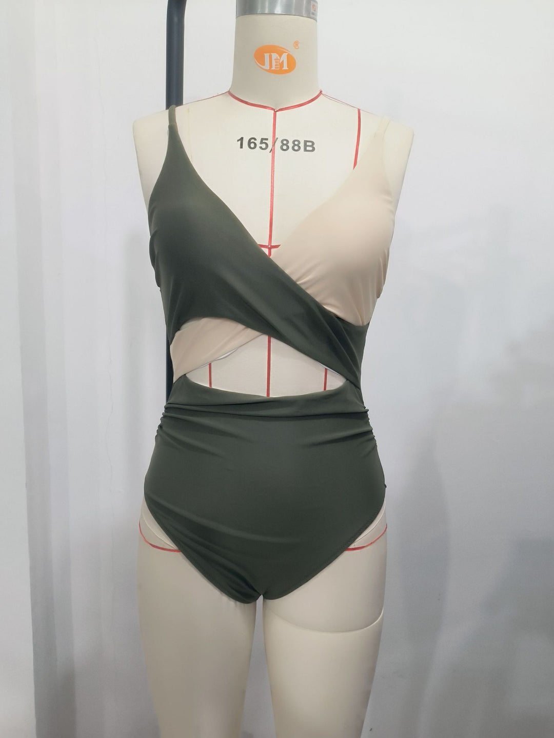 Damen Modern gestalteter Einteiler-Badeanzug mit asymmetrischem Schnitt und Wickeldetails Drune