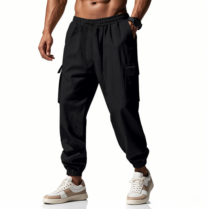 Herren Cargo-Trainingshose mit elastischem Bund und praktischen Seitentaschen Drune