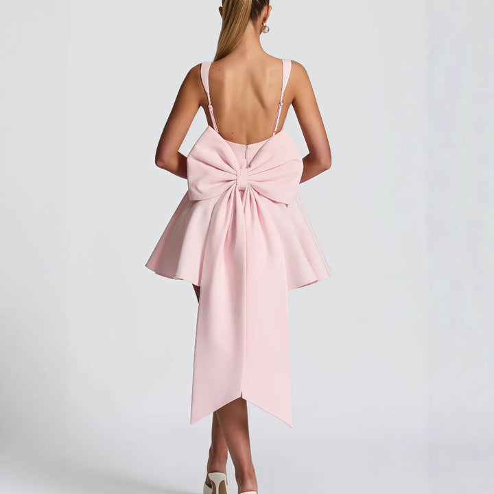 Damen Cocktailkleid mit oversized Schleifen-Design und fließendem Rock Drune